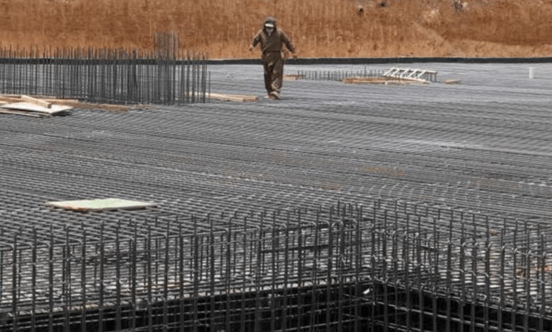 Steel mesh at a construction site in Riyadh. PIF and Sabic plan to create a 'national champion' for steel