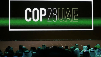 'Cop28 UAE' logo is displayed on the screen during the opening ceremony of Abu Dhabi Sustainability Week (ADSW) under the theme of 'United on Climate Action Toward COP28', in Abu Dhabi, UAE, January 16, 2023. REUTERS/Rula Rouhana Acquire Licensing Rights