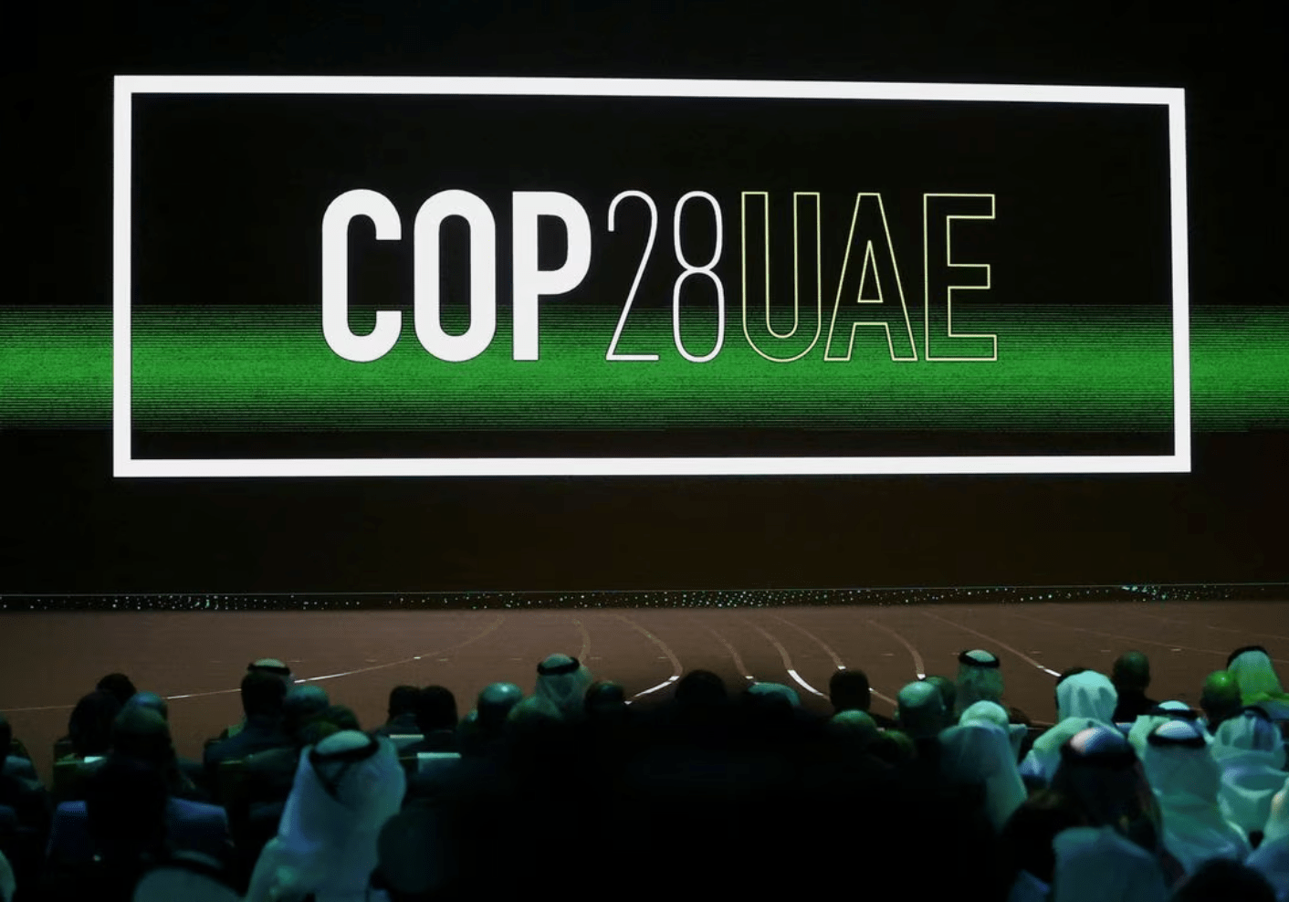 'Cop28 UAE' logo is displayed on the screen during the opening ceremony of Abu Dhabi Sustainability Week (ADSW) under the theme of 'United on Climate Action Toward COP28', in Abu Dhabi, UAE, January 16, 2023. REUTERS/Rula Rouhana Acquire Licensing Rights