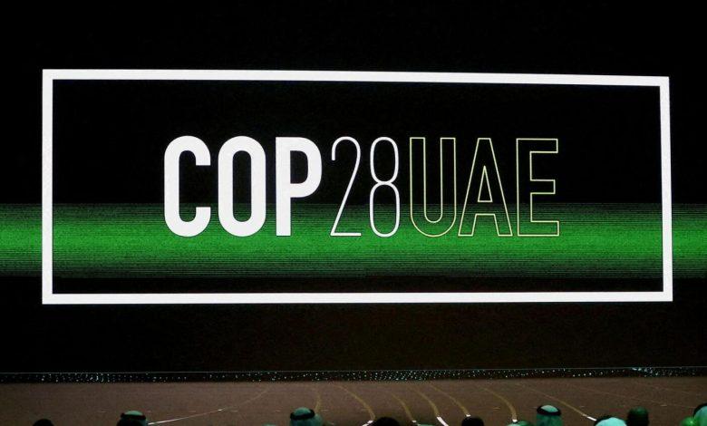 Cop28 UAE' logo is displayed on the screen during the opening ceremony of Abu Dhabi Sustainability Week (ADSW). — File photo