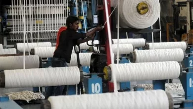 An employee working at a textile factory in Pakistan's port city of Karachi, on April 7, 2011. — AFP Source: Thenews.com.pk
