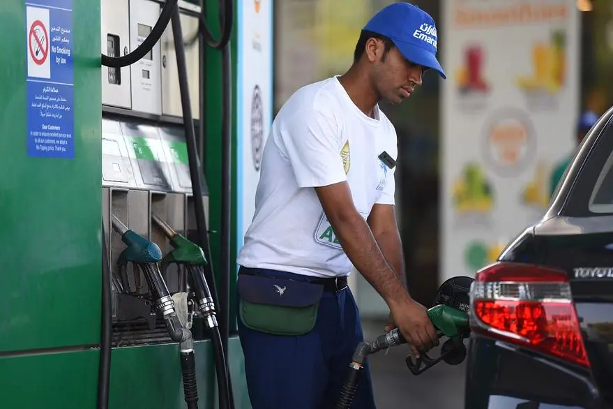 Emarat petrol station attendant fills up the tank of a car on September 25, 2017 in Dubai, United Arab Emirates. (Photo by Tom Dulat:Getty Images) Source: Zawya.com