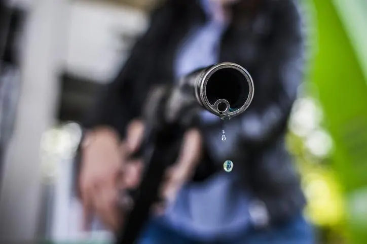 Image used for illustrative purpose. A petrol droplet falls from a fuel pump at a gas station. Getty Images. Source: Zawya.com