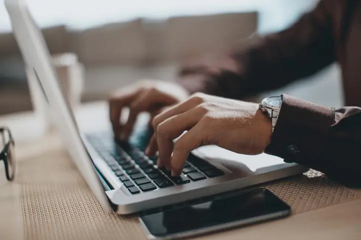 Image used for illustrative purpose. Hands typing on laptop computer. Getty Images Source: Zawya.com