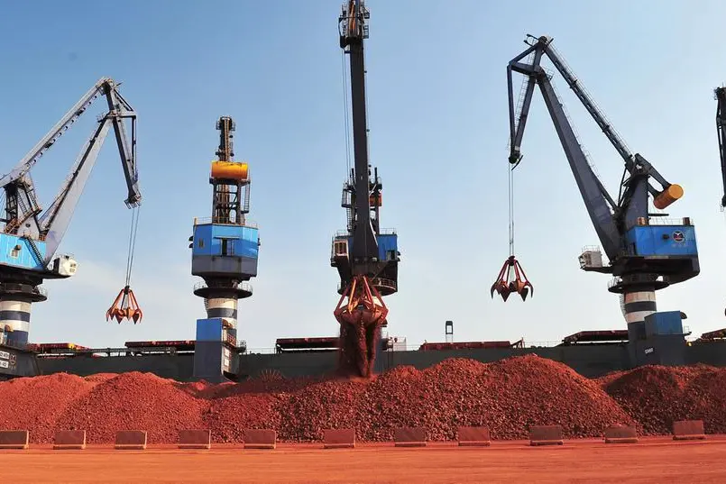 FILE PHOTO: A ship carrying bauxite from Guinea is unloaded at a port in Yantai, Shandong province, China May 15, 2017. REUTERS/Stringer Reuters Source: Zawya.com